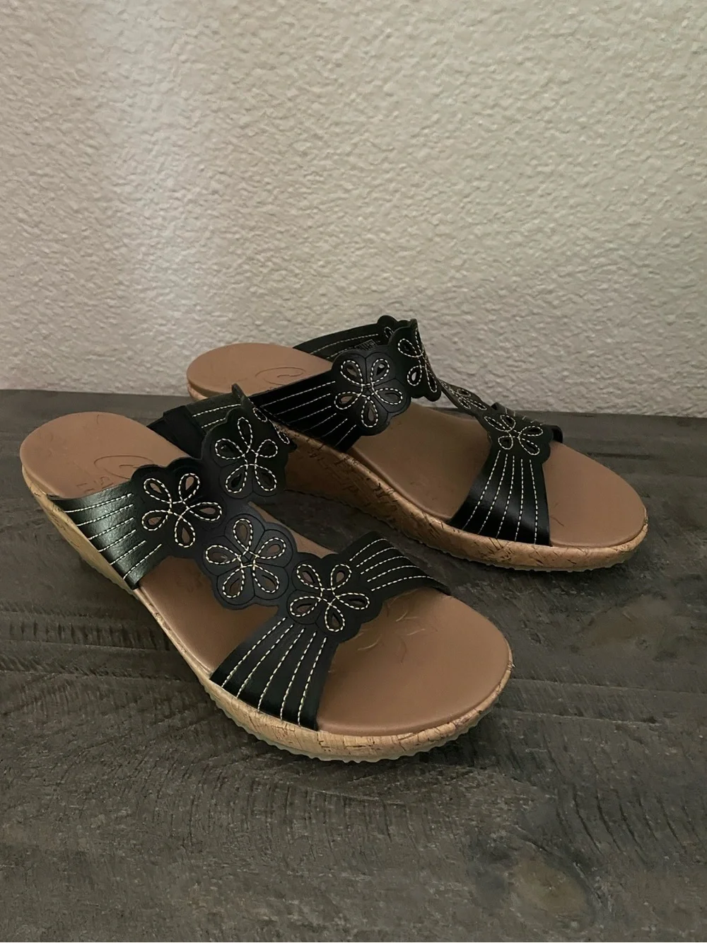 Cali from Skechers Luxe Foam Women's Black Floral Slide Sandals with Cork Wedge